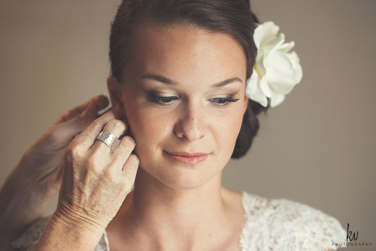Bride getting ready at Highland Manor on her wedding day
